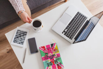 The Rise of Side Hustles: How Gen Z Is Redefining Work top view laptop coffee table 1